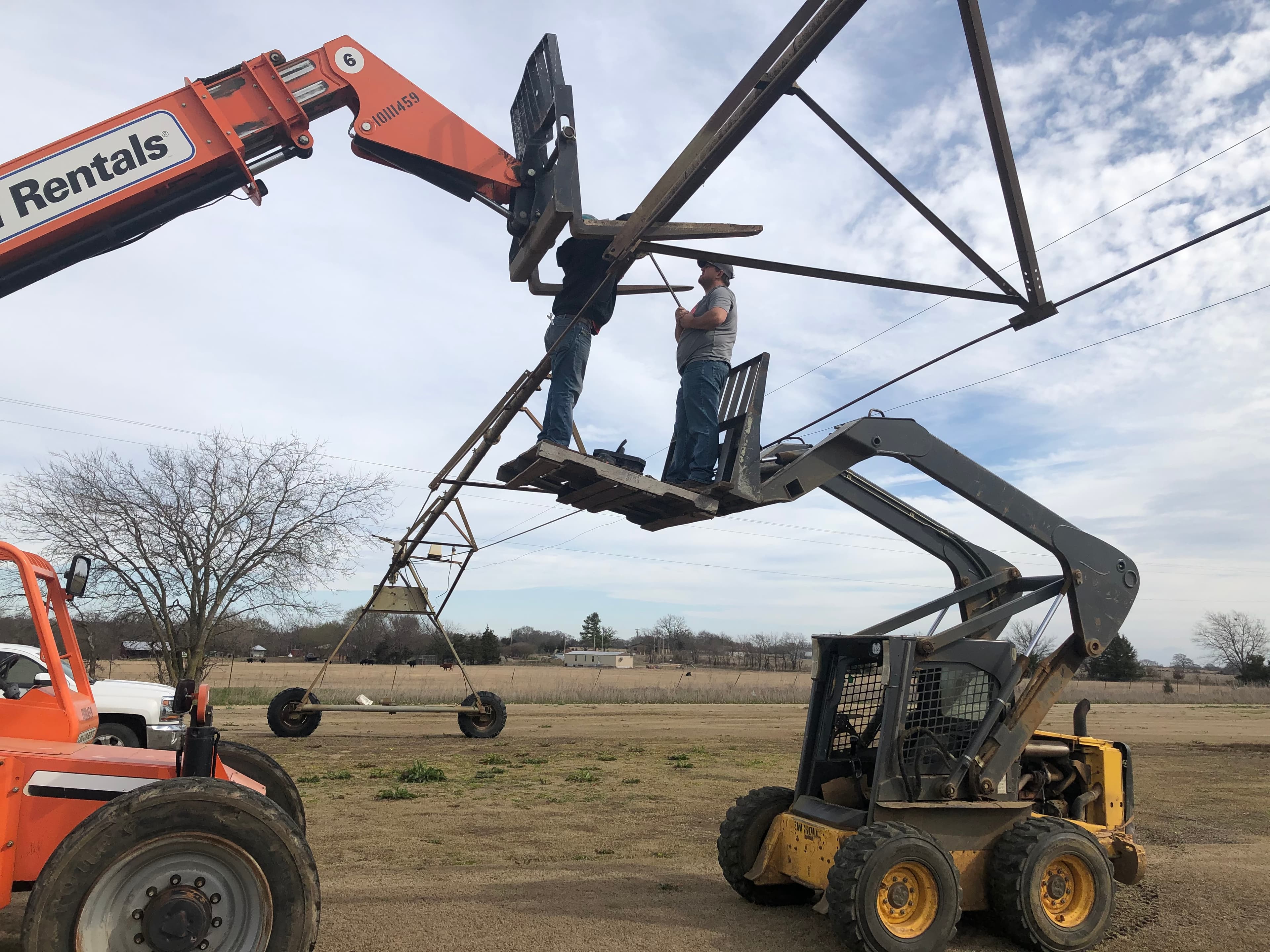 Team performing pivot maintenance